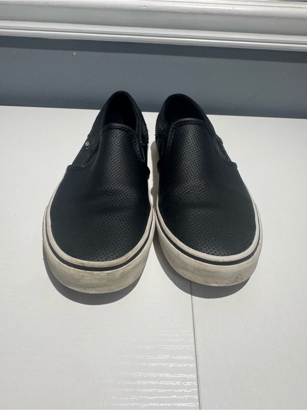 Vans Black Perforated Slip-On Sneakers with White Sole
